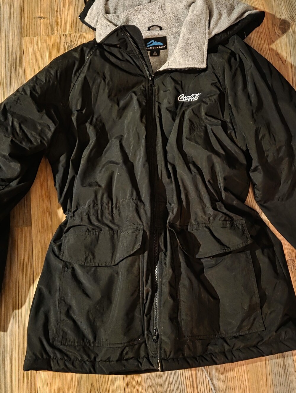 Coca Cola Black Jacket with Light Gray Sherpa Lining and Removable Hood - Picture 8 of 8